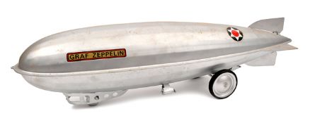 A scarce very large American Steelcraft heavy duty tinplate push-pull along ‘Graf Zeppelin’