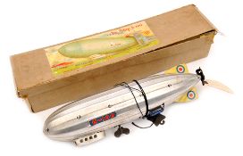A Japanese light alloy R-100 clockwork airship by C.K. in silver light alloy 28cm ‘R.100’ in red