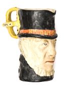 An interesting Boer War coloured pottery mug depicting the head of Paul Kruger, wearing his