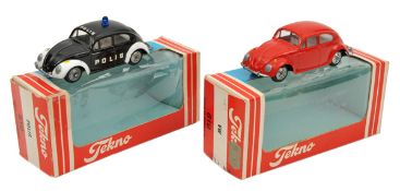 2 Tekno Volkswagen Beetle Saloons. One in black and white Polis livery and one in bright red. Both