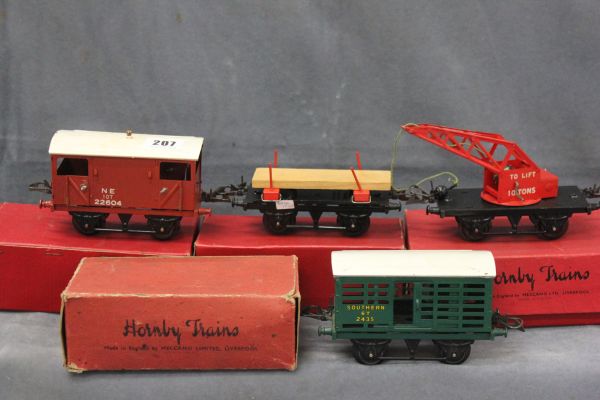 Boxed Hornby O Gauge No.1 Crane Truck, Goods Brake Van, No.1 Lumber Wagon and No.1 Milk Traffic Van