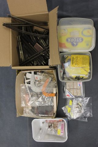 Two boxes of Miniature Railway spare parts