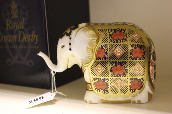 A Royal Crown Derby `Gumps` Elephant  Limited Edition Paperweight, boxed with certificate