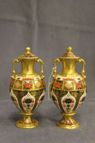 A Pair of Royal Crown Derby `Old Imari` Twin Handled Urns approximately 9"