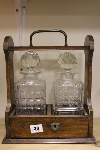 An Oak Cased Two Bottle Tantalas with Two Glass Decanters