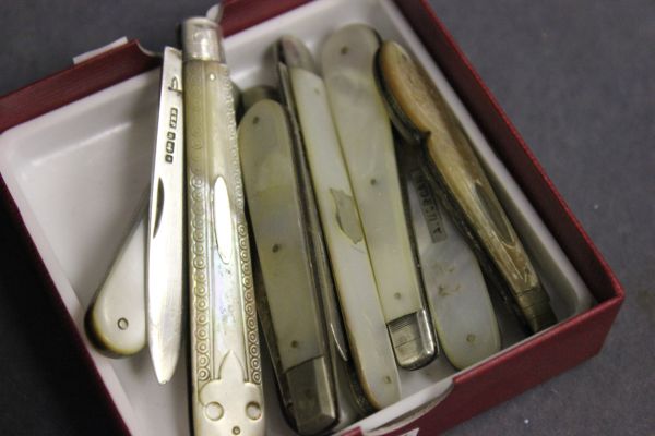 Eight Silver Banded Fruit Knives with Mother of Pearl Handles