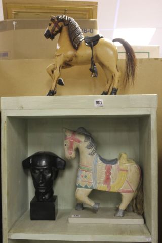 A Composite Bust of a 19th century Gent, a Reproduction Horse on wheels and another horse figurine