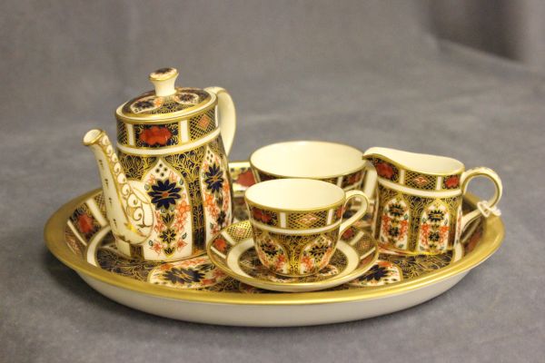 A Royal Crown Derby `Old Imari` Miniature Solitaire Set comprising Teapot, Sugar, Milk, Cup and