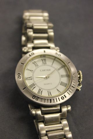 A Ladies replica Cartier Watch