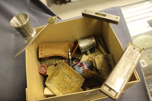 A Mixed Box of Collectables including Lighters, a Harmonica, Pens etc