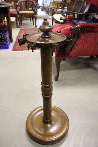 An Edwardian Oak Cue Stand