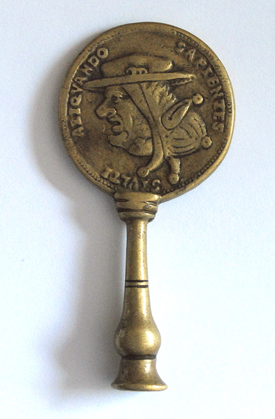 16th Century: Anti-Catholic Pope & Devil illusion coin pipe tamper A small anti-Catholic cast coin