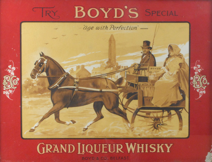 circa 1905: Boyd`s of Belfast Grand Liqueur Whisky advertisement14.5 by 19.5in.Framed colour
