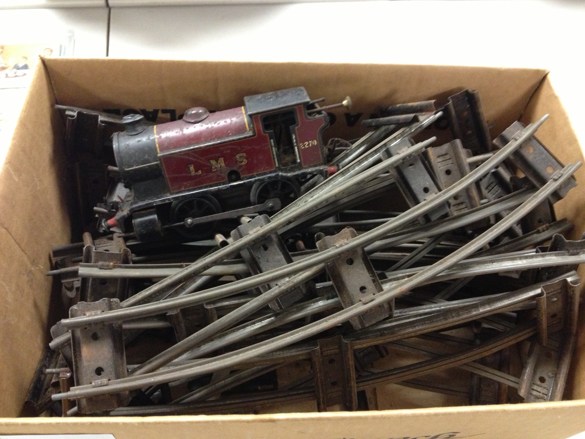 Box containing Hornby loco and QTY of traintrack