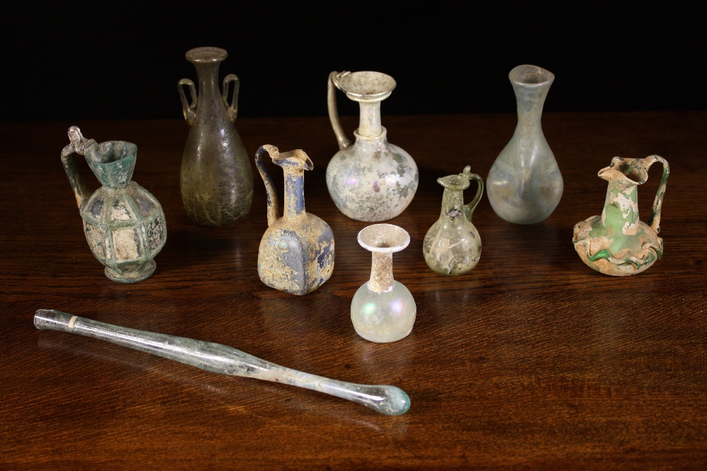 A Collection of 9 Pieces of Roman Glassware: