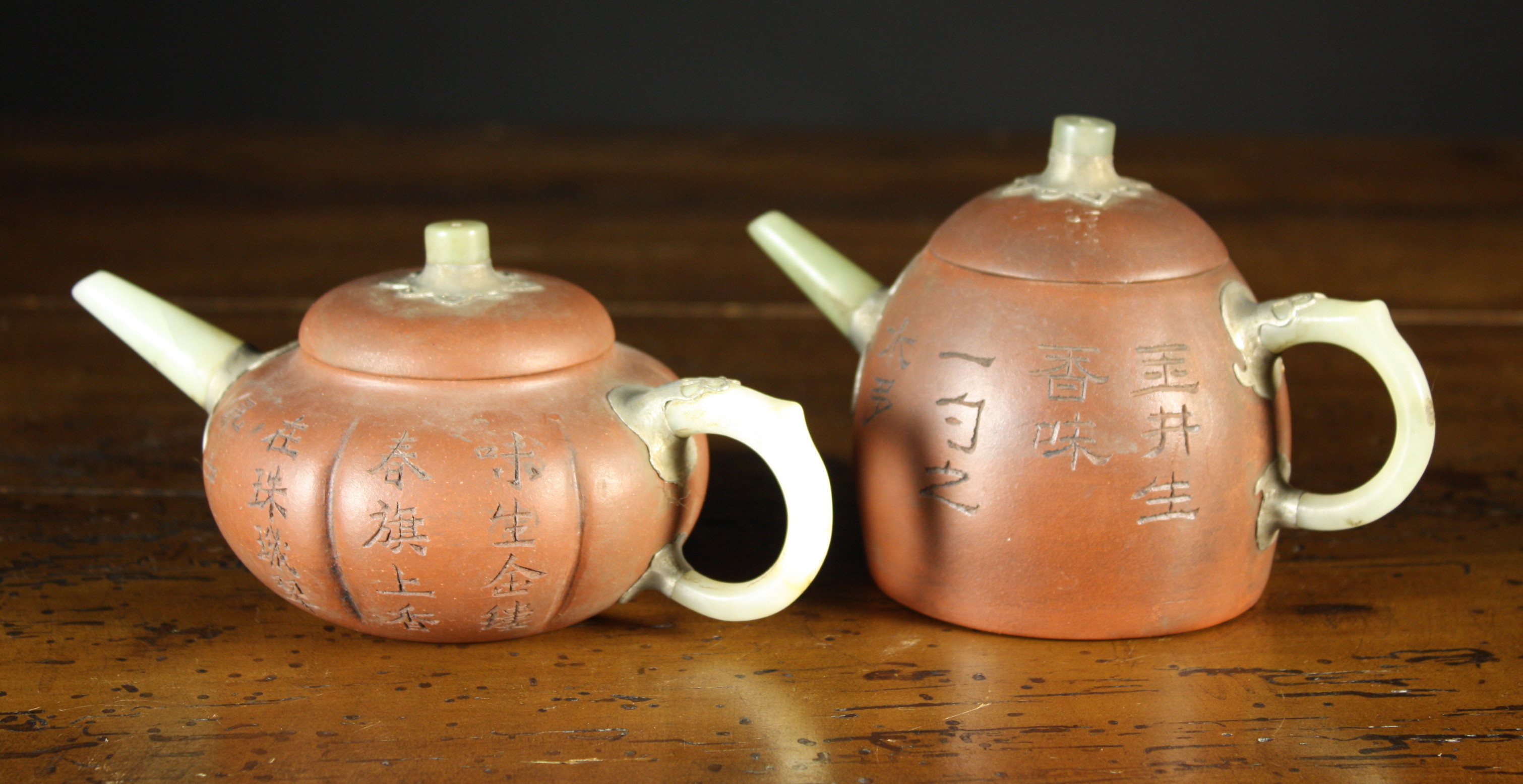 Two Small Yixing Teapots with incised decoration and fitted with  jade handles, spouts and knop