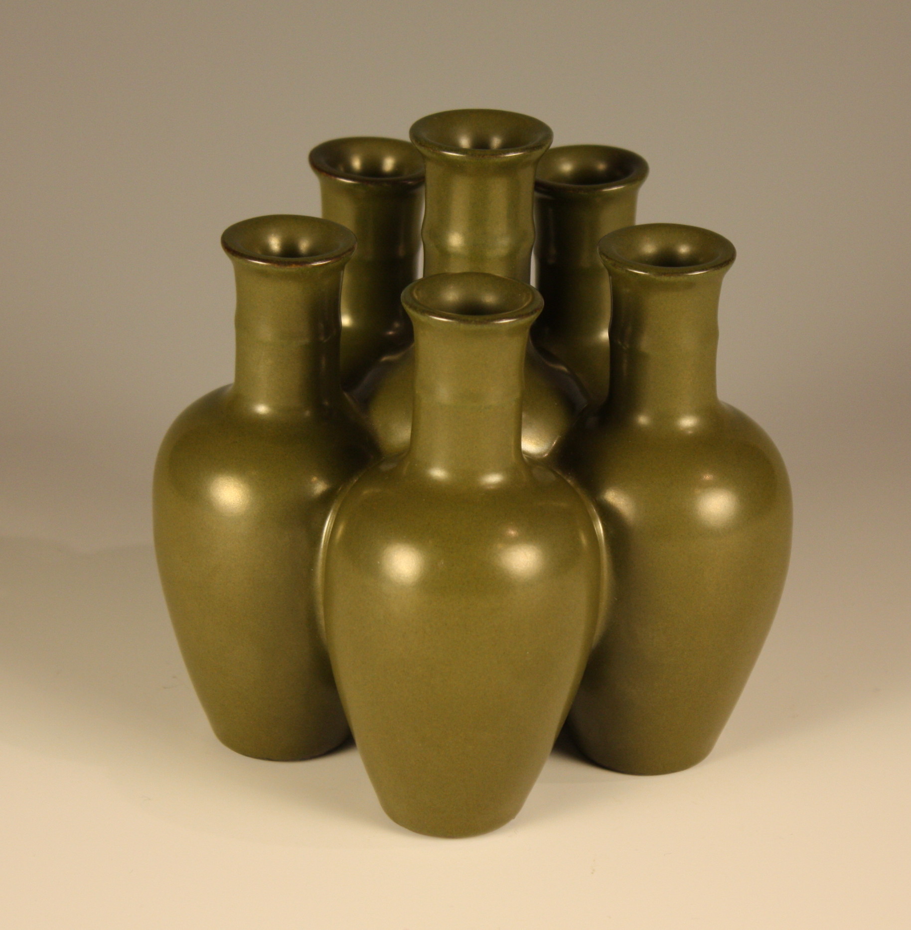 An Unusual Teadust Glazed Conjoined Vase Group.  The six Rouleay-form vases joined as a single unit,