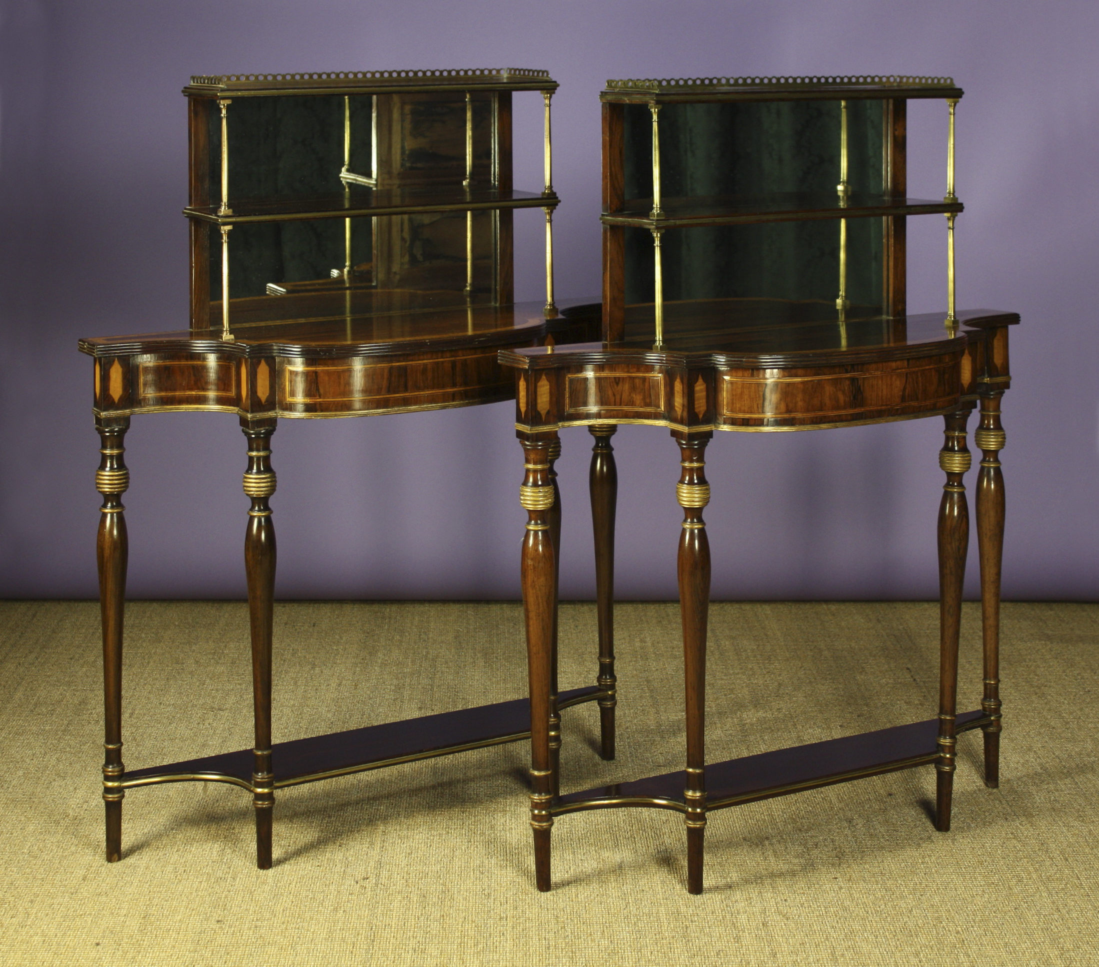 A Pair of Fine Sheraton Side Cabinets (one a copy).  The bow-front tops veneered in rosewood with