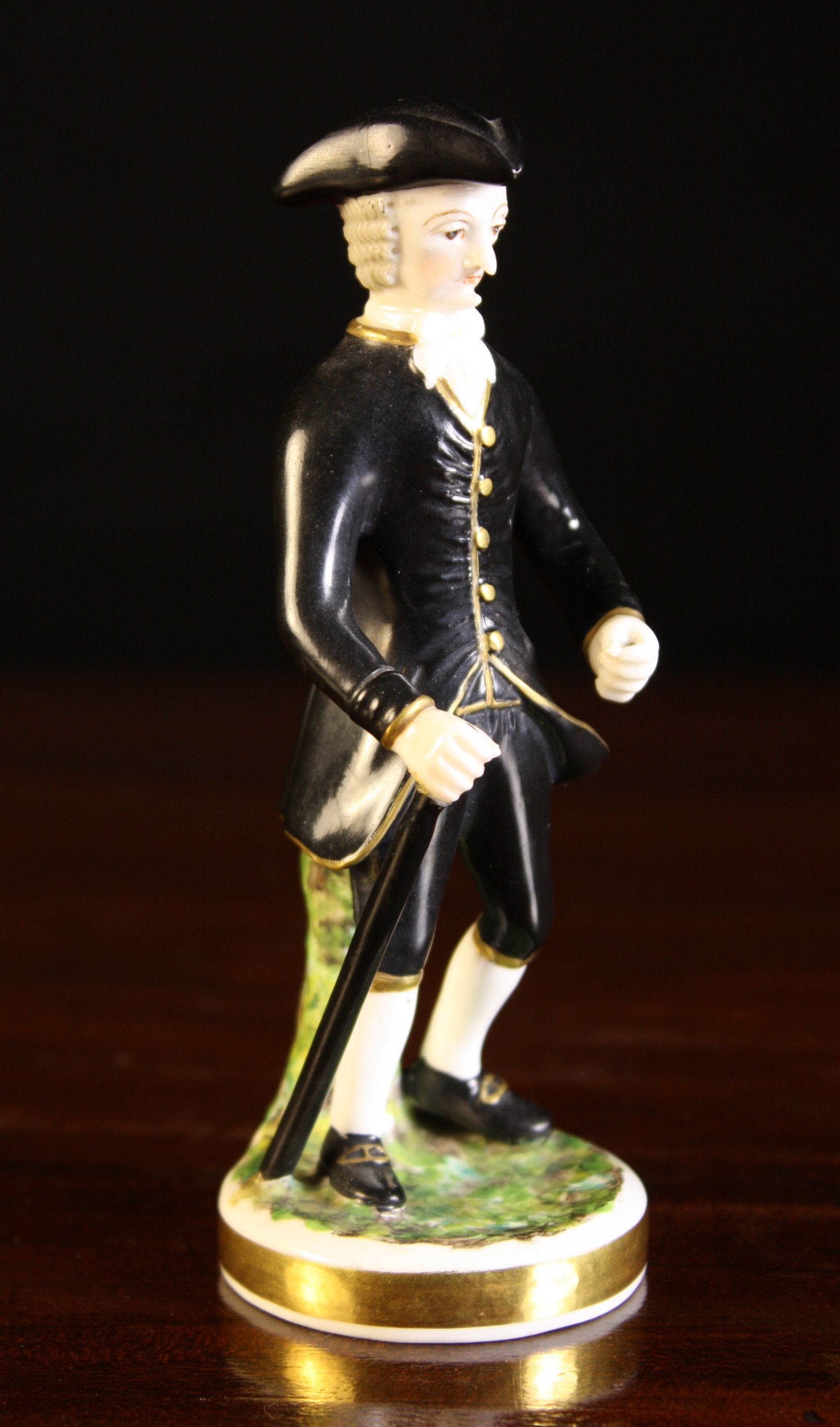 A King Street Derby Porcelain Figure of Dr Syntax, 5¼ ins (13.5 cms) in height.