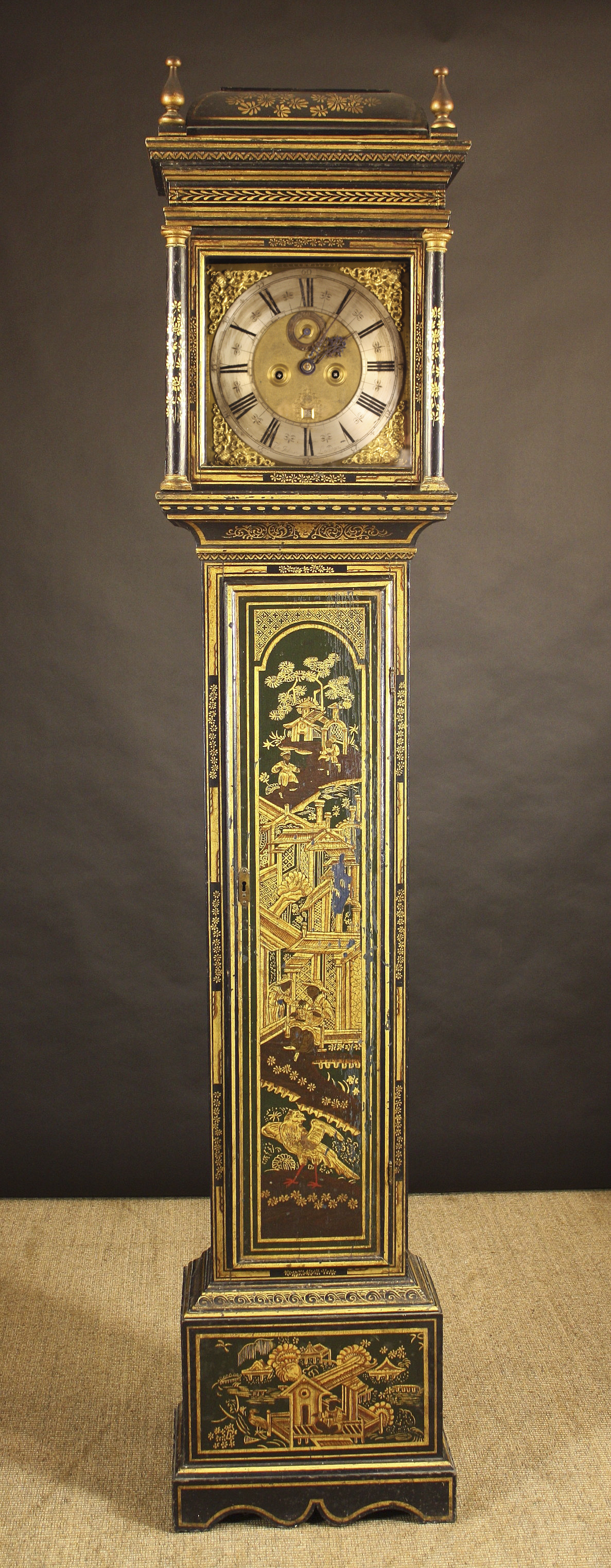 An 18th Century Japanned Eight Day Longcase Clock.  The 11¾  inch (30 cms) square brass dial with