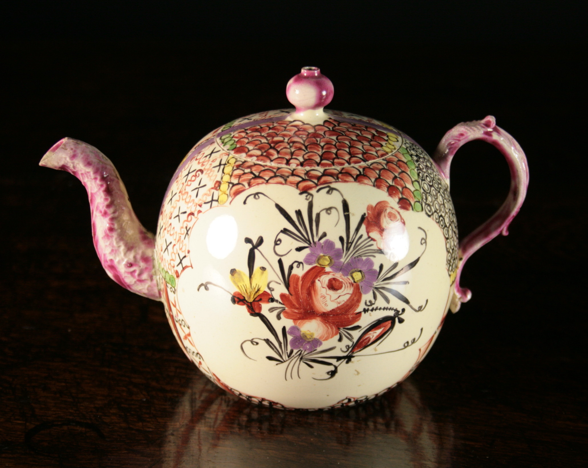 A Rare Wedgwood Creamware Teapot Circa 1775, decorated by David Rhodes with flowers and chintz, 5¼