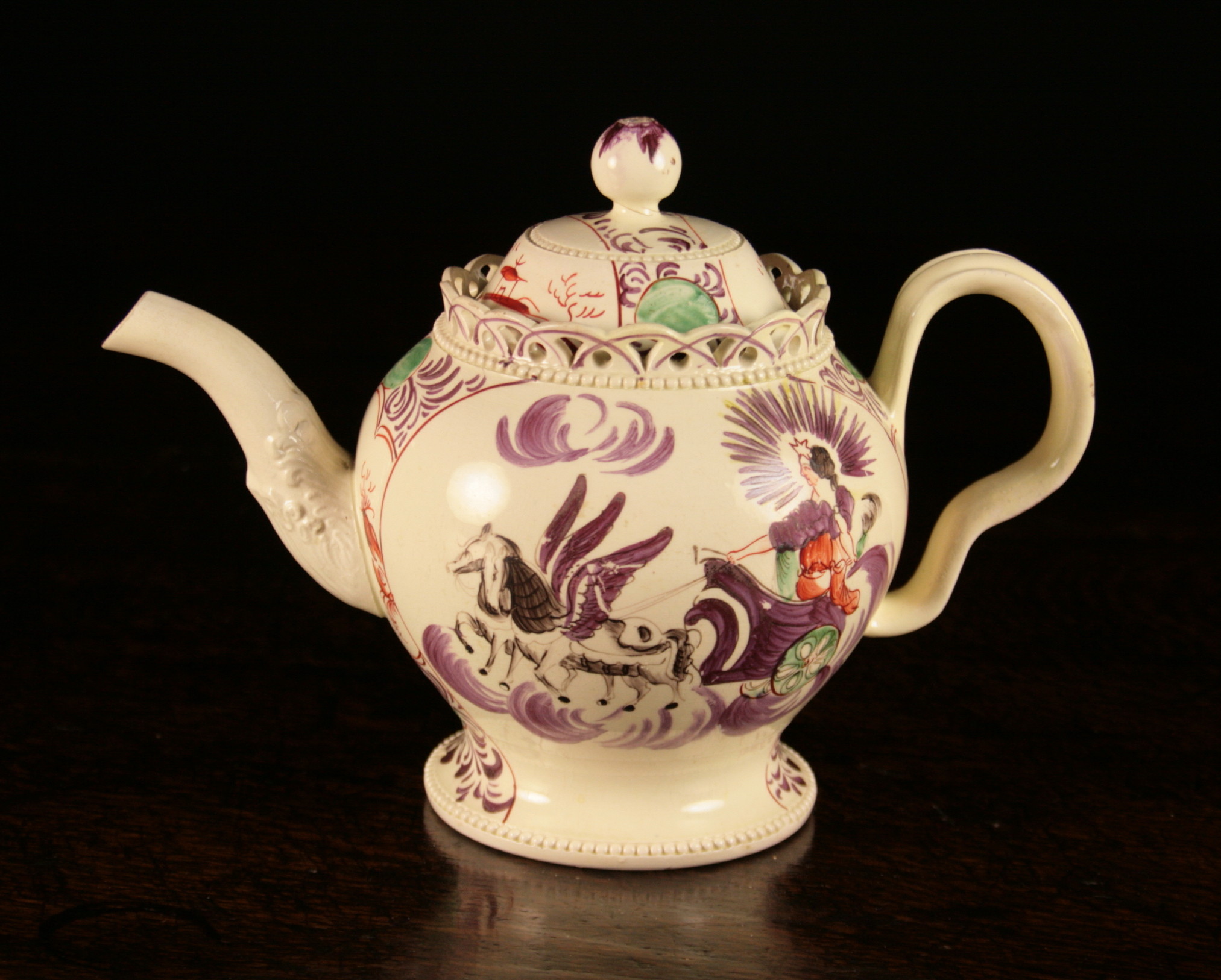 An 18th Century William Greatbatch Creamware Teapot Circa 1770-82, hand painted with Aurora riding a