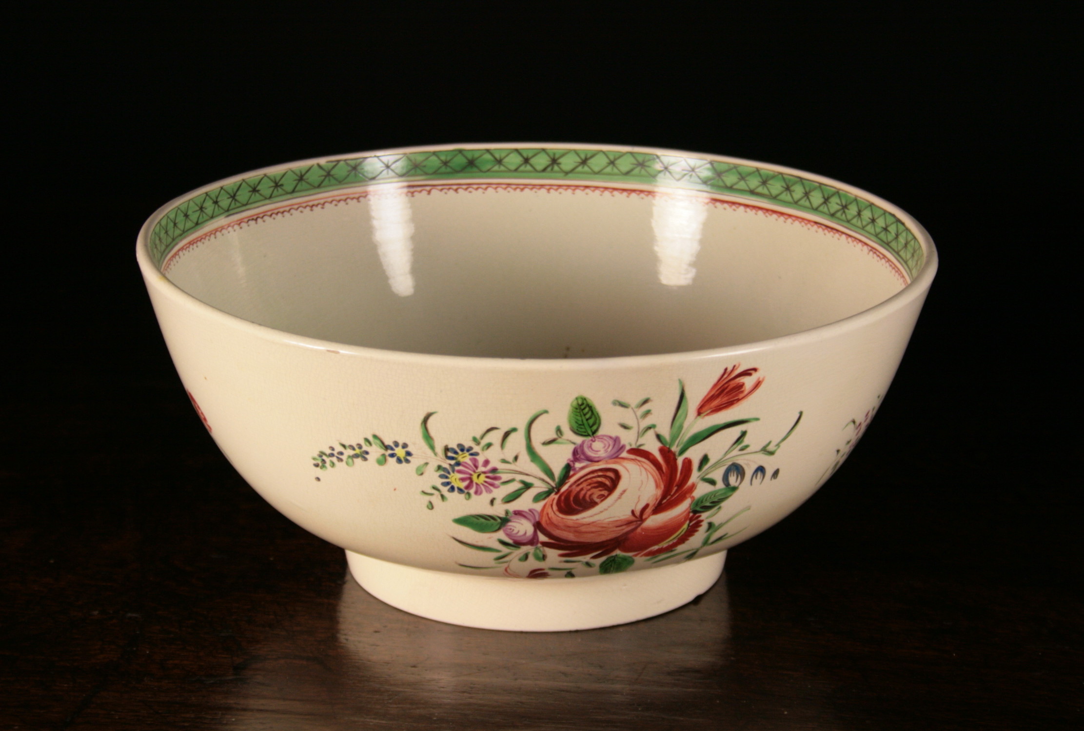 An 18th Century Creamware Bowl inscribed 'D, Walker Success to the Crafts 1787' to the interior,