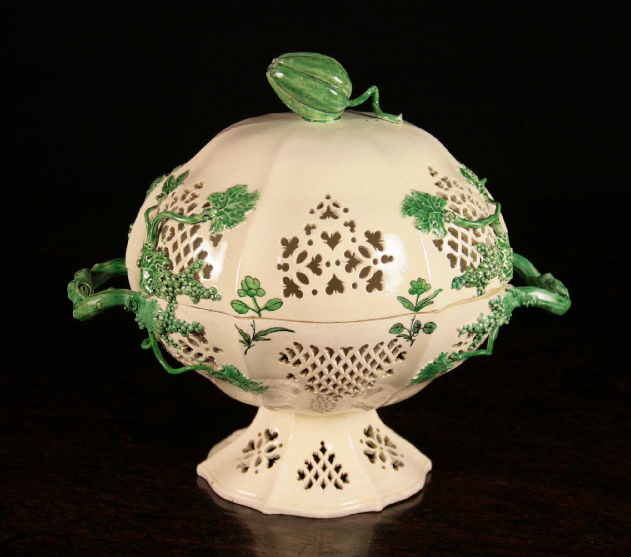 A Leeds Creamware Chestnut Basket & Cover on a pedestal foot  intricately pierced with decorative