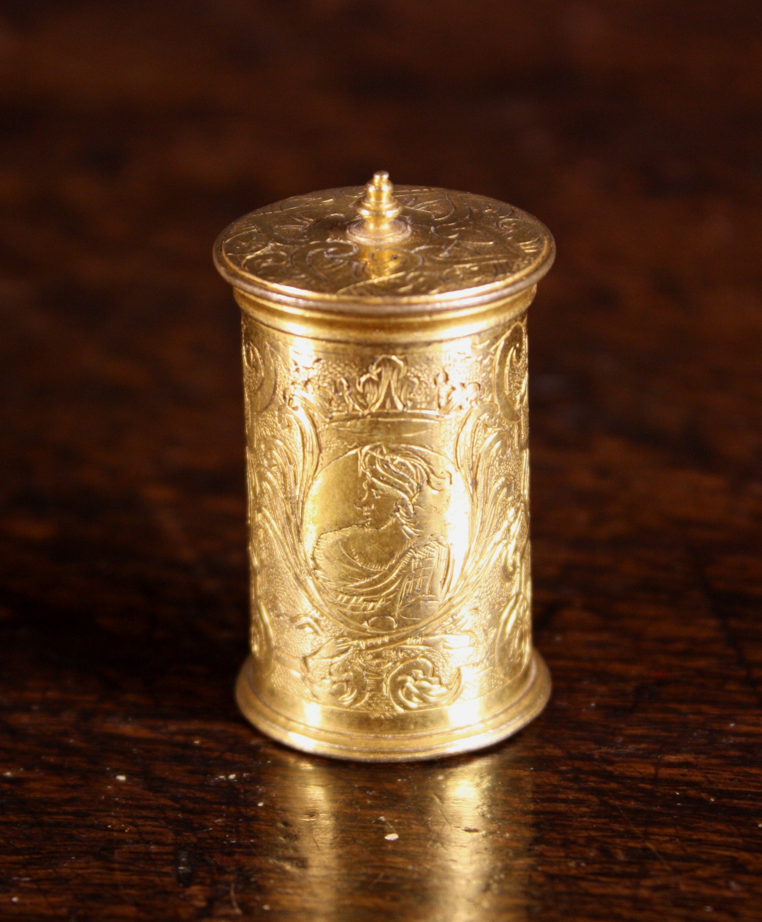 A Fine 16th Century Engraved Gilt Bronze Spice Pot with screw seal lid. The sides embellished with