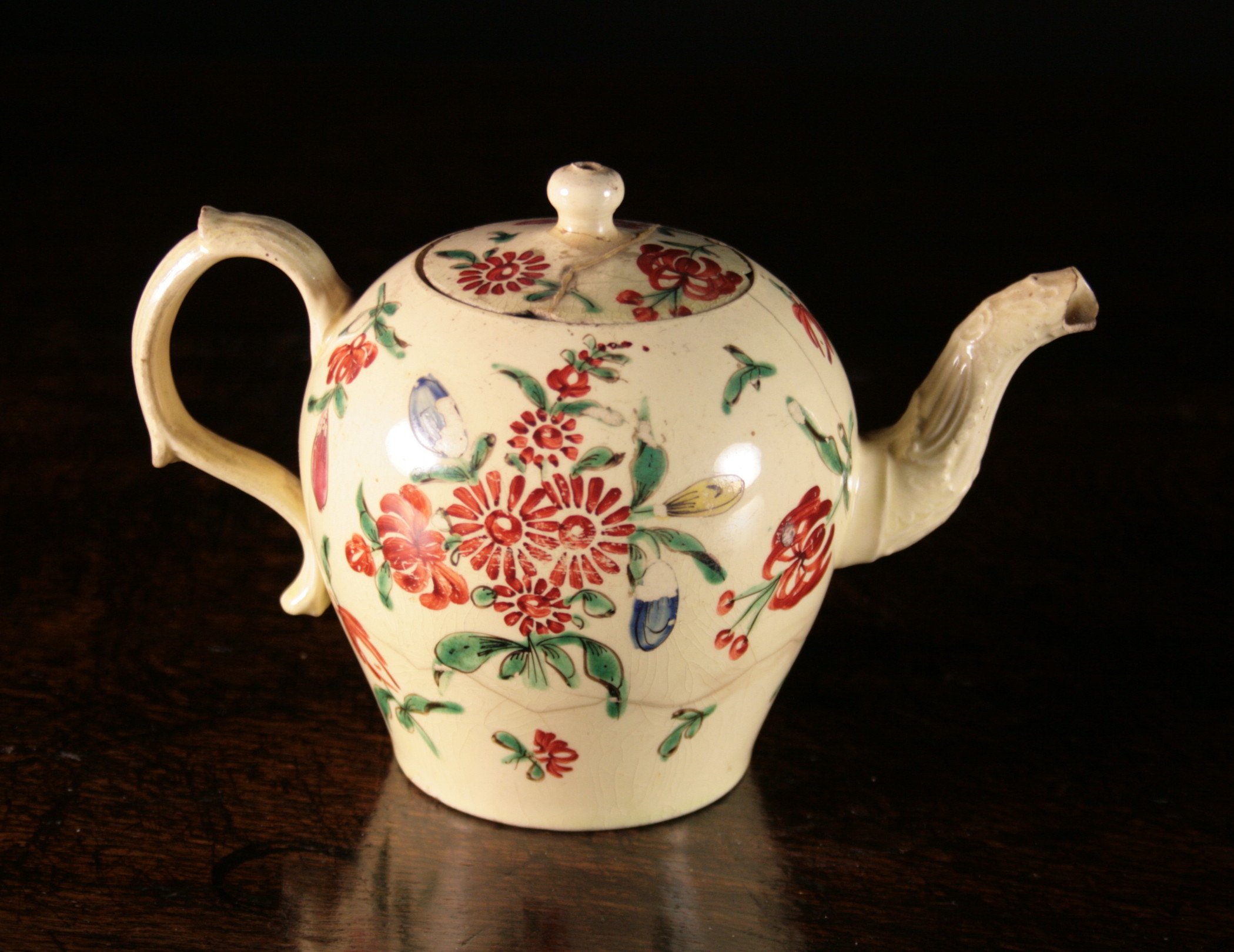 An 18th Century Creamware Teapot (A/F) attributed to Cockpit Hill Pottery, Derbyshire Circa 1760-80,