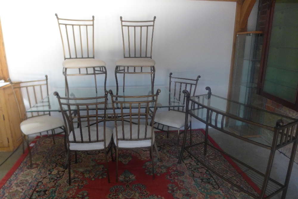 A dining table with a glass top - 170 cm x 110 cm and six dining chairs and a matching consul table