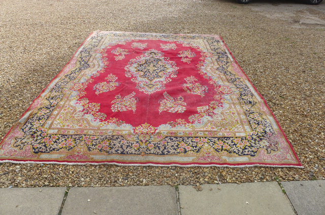 A vintage Persian rug - 358cm x 258cm Condition report: has overall wear