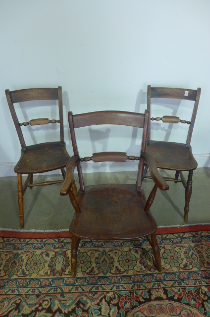 A 19th century knife back Windsor chair and a similar armchair