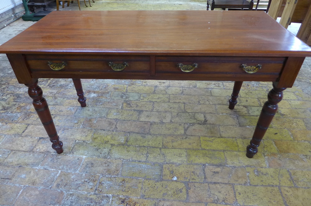 A late Victorian two drawer hall table - Height 88cm x Depth 55cm x Width 1.22m