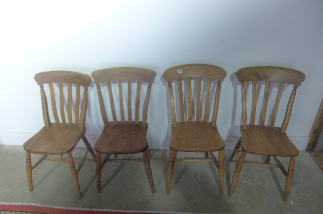 A set of four 19th century Windsor kitchen chairs