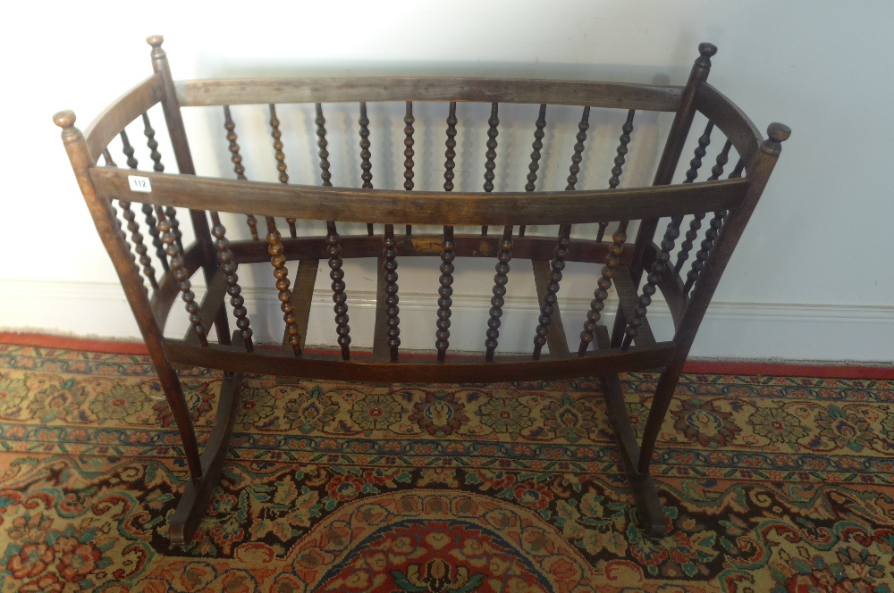 A beechwood bobbin turned crib 1.04m long