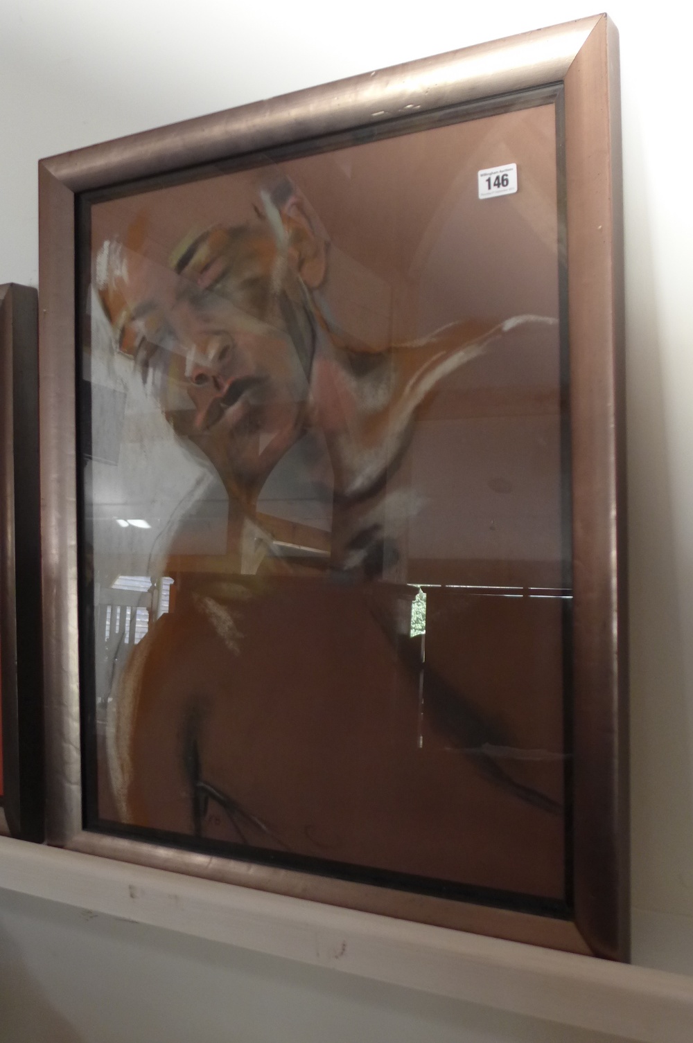 A framed Katy Bailey pastel `Will` head and upper torso of a sleeping young man initialled K. B. -