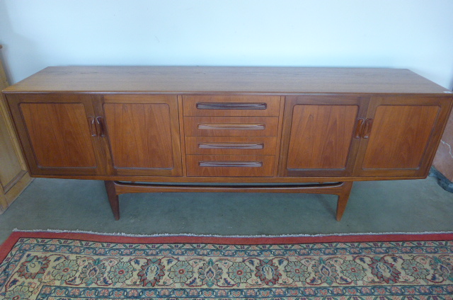 A G Plan teak sideboard with four central drawers and two sets of cupboard doors - Height 79 cm x