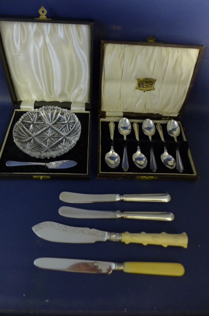 A boxed set of silver teaspoons Birmingham 1930, a butter dish and silver knife and assorted