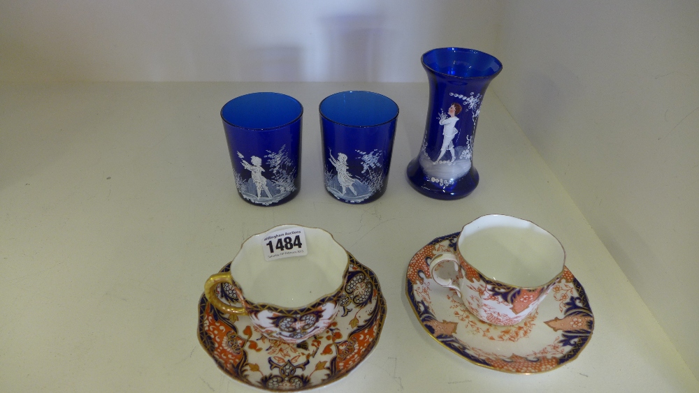 Two Royal Crown Derby cups and saucers