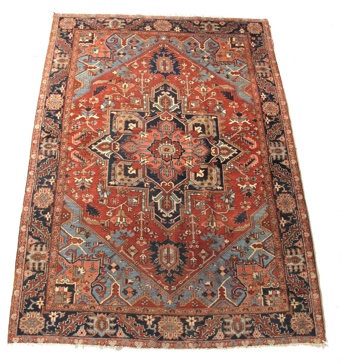 A Heriz carpet, north west Persia, c.1930-50, 125½ x 88in (319 x 224cm).