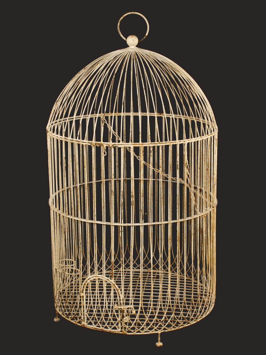 A white painted wirework birdcage, 43in (109.5cm) high, 24in (61cm) diameter.