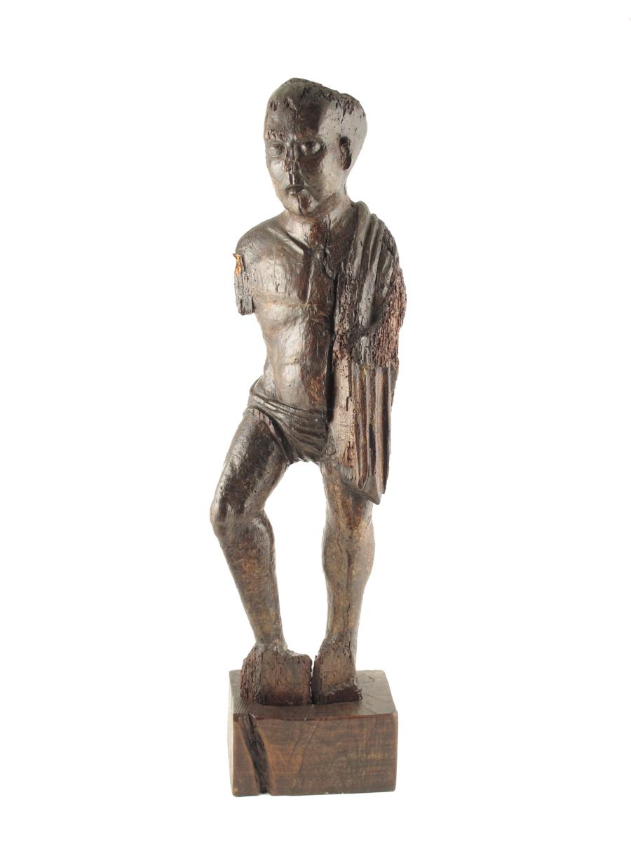 A carved wood and polychrome decorated standing model of a Roman centurion, possibly 15th / 16th