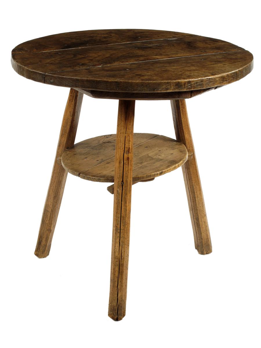 A chestnut and fruitwood cricket table, 26?in (66.6cm) high, 26?in (66.6cm) diameter.