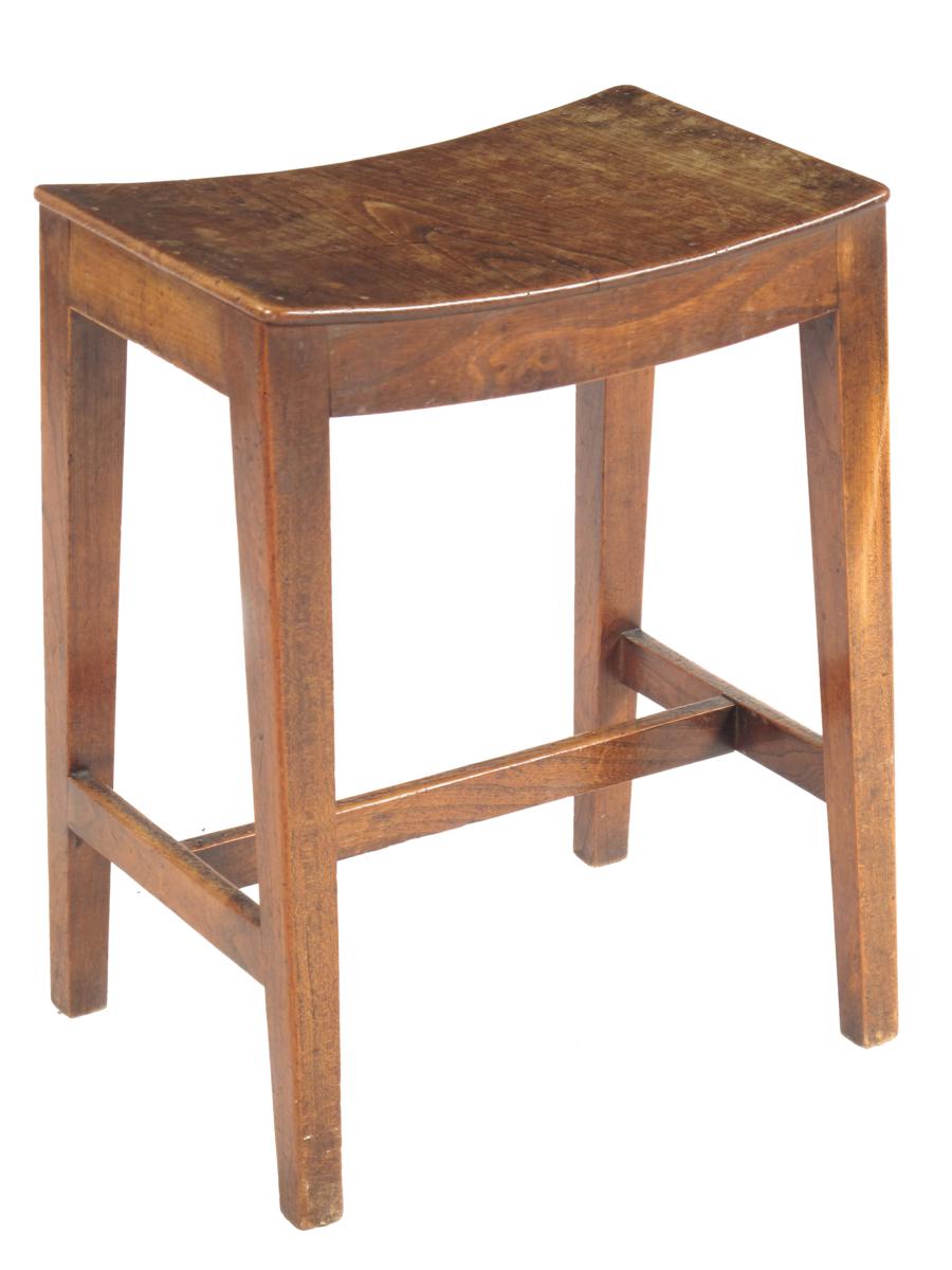 A 19th century East Anglian elm stool, with a dished seat, 21½in (54.5cm) high, 16½in (41.8cm) wide,