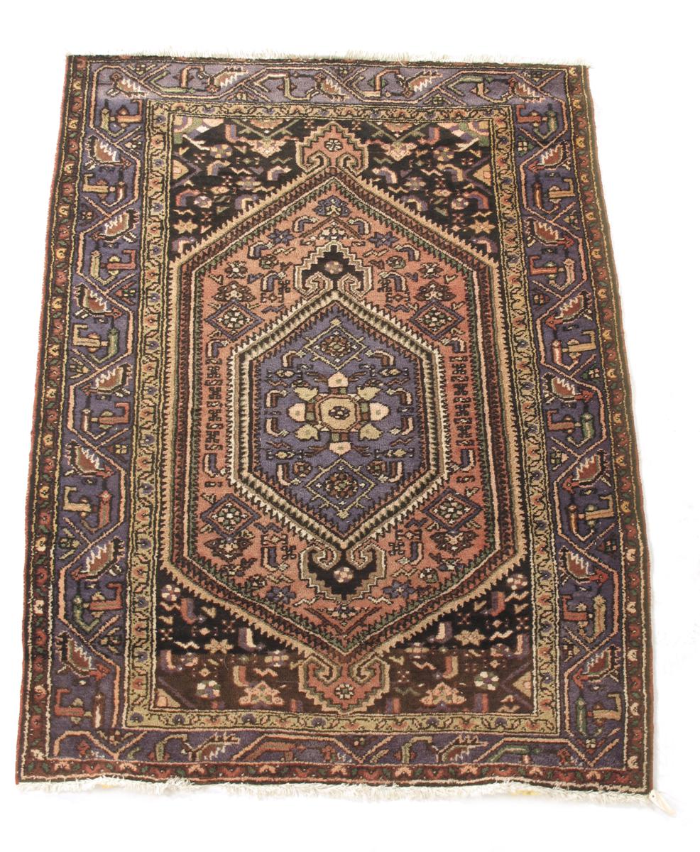 A Bakhtiari rug, south west Persia, c.1930, 76 x 57in (193 x 145cm) and a Tabriz rug, north west