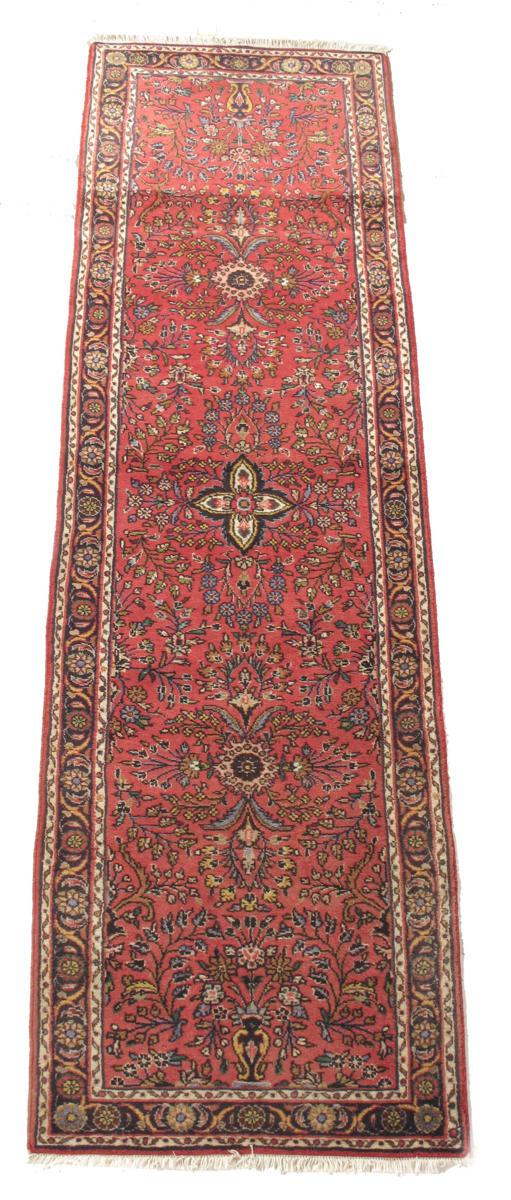 A Lilihan runner, north west Persia, c.1930-50, 117 x 34in (297 x 86.5cm).