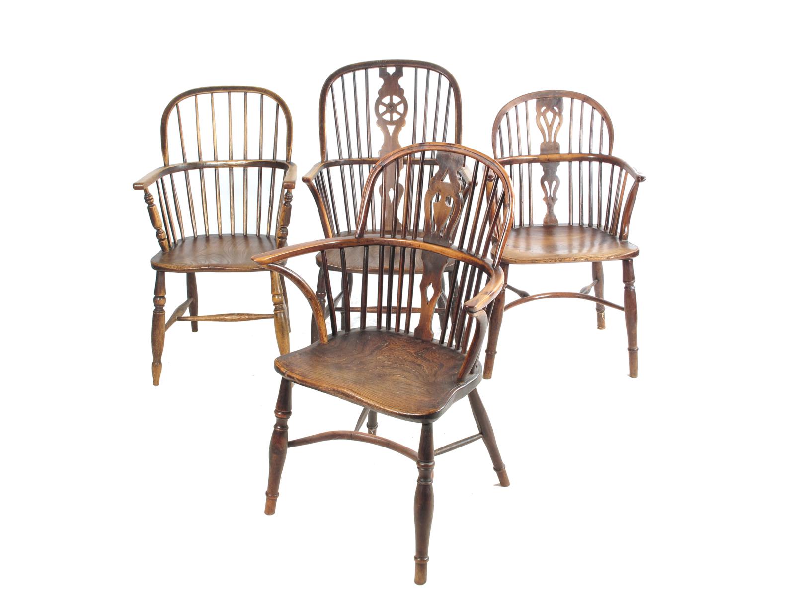 A 19th century yew low back Windsor armchair, with a pierced splat and an elm seat, another yew