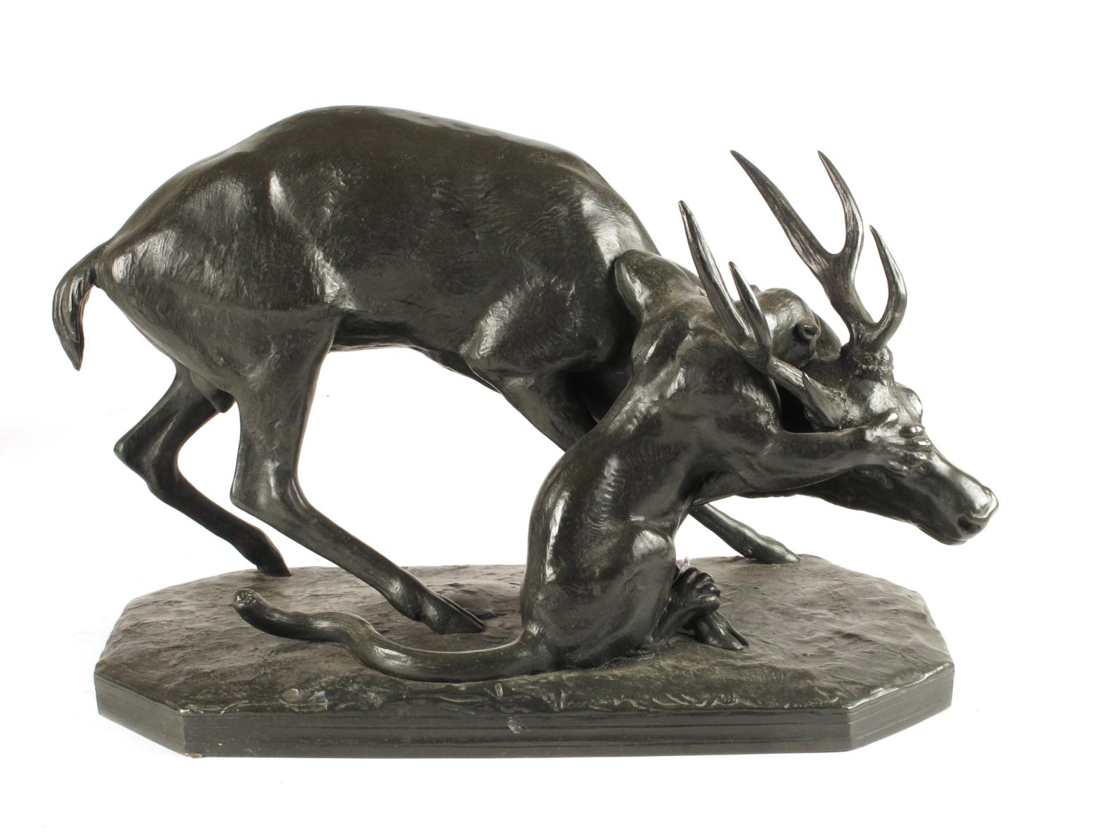 After Antoine-Louis Barye (1796-1875). A panther seizing a stag, bronze with green patination,