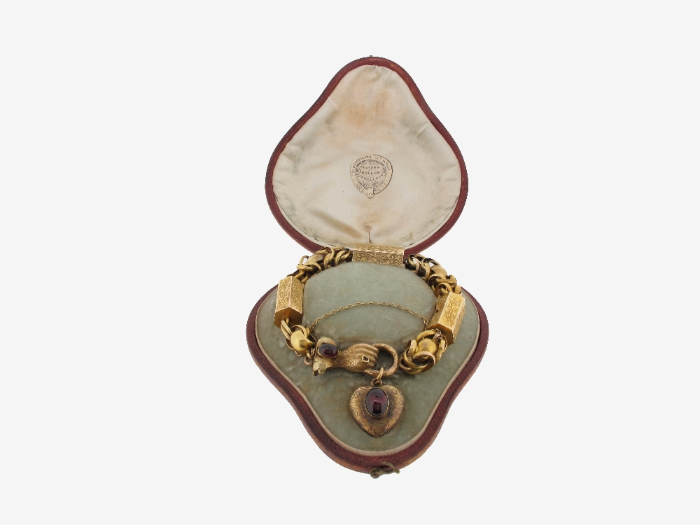 A 19th Century gold fancy link bracelet, the clasp hand and heart shaped locket pendant each set